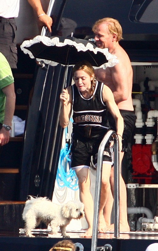 madonna umbrella madonna = Mary Poppins on Meth